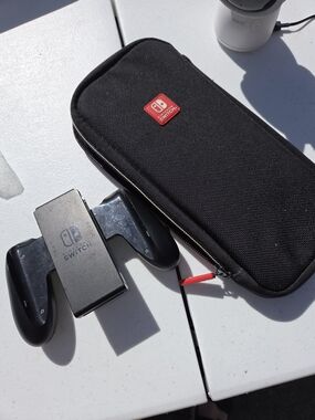 Nintendo Black Travel Case with Red Accent and Controller Grip